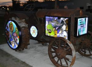 A tractor with stained glass installations.
